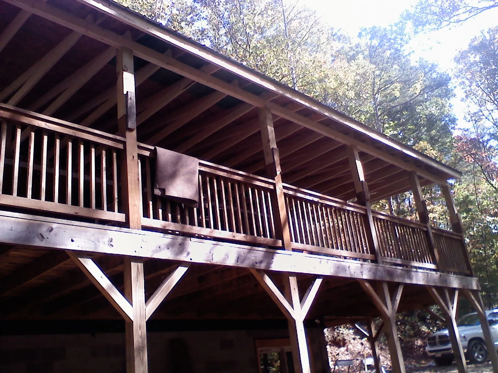 Timber framing under a new elevated porch and deck — Roof Leak Repair in Poca by Roofing Brothers